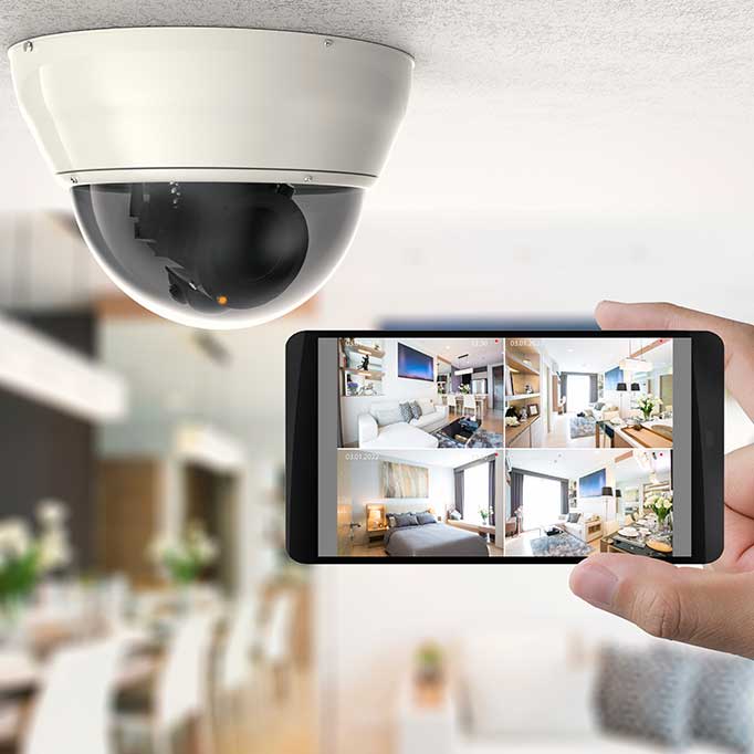A ceiling-mounted camera along with the access app on your phone A ceiling-mounted camera along with the access app on your phone